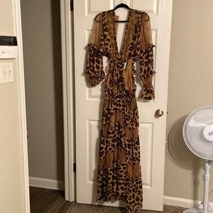 Gorgeous leopard mix dress with the sides out